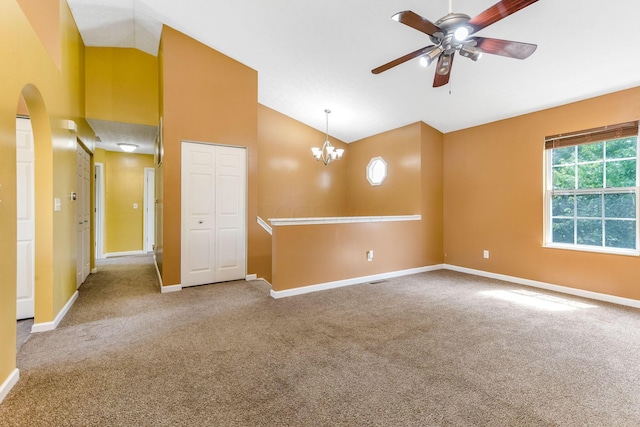 5733 Canal Bridge Dr, Canal Winchester, OH 43110 - unfurnished room with carpet flooring, high vaulted ceiling, ceiling fan, a chandelier, and arched walkways