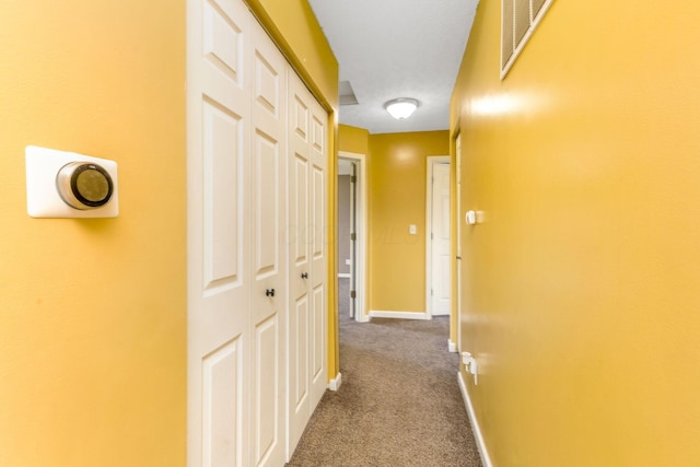 5733 Canal Bridge Dr, Canal Winchester, OH 43110 - corridor with dark colored carpet and baseboards