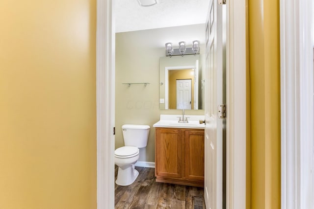 5733 Canal Bridge Dr, Canal Winchester, OH 43110 - half bathroom featuring vanity and wood finished floors