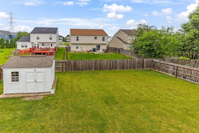 5733 Canal Bridge Dr, Canal Winchester, OH 43110 - fenced backyard featuring a storage shed, a wooden deck, and a residential view