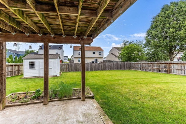 5733 Canal Bridge Dr, Canal Winchester, OH 43110 - fenced backyard with a patio area, a storage unit, and a residential view