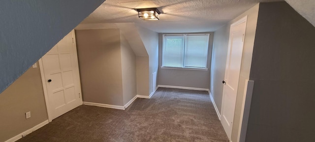1710 Hess Blvd, Columbus, OH 43212 - additional living space featuring dark carpet and a textured ceiling