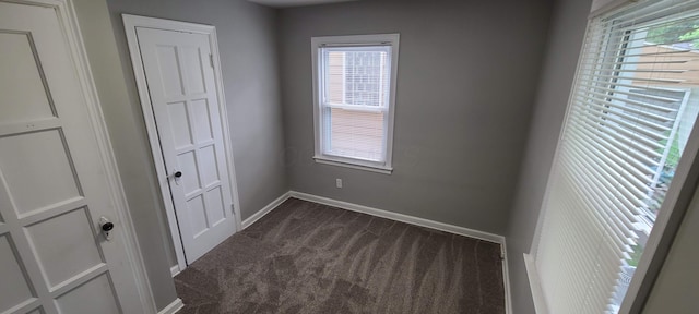 1710 Hess Blvd, Columbus, OH 43212 - unfurnished bedroom featuring dark carpet and baseboards
