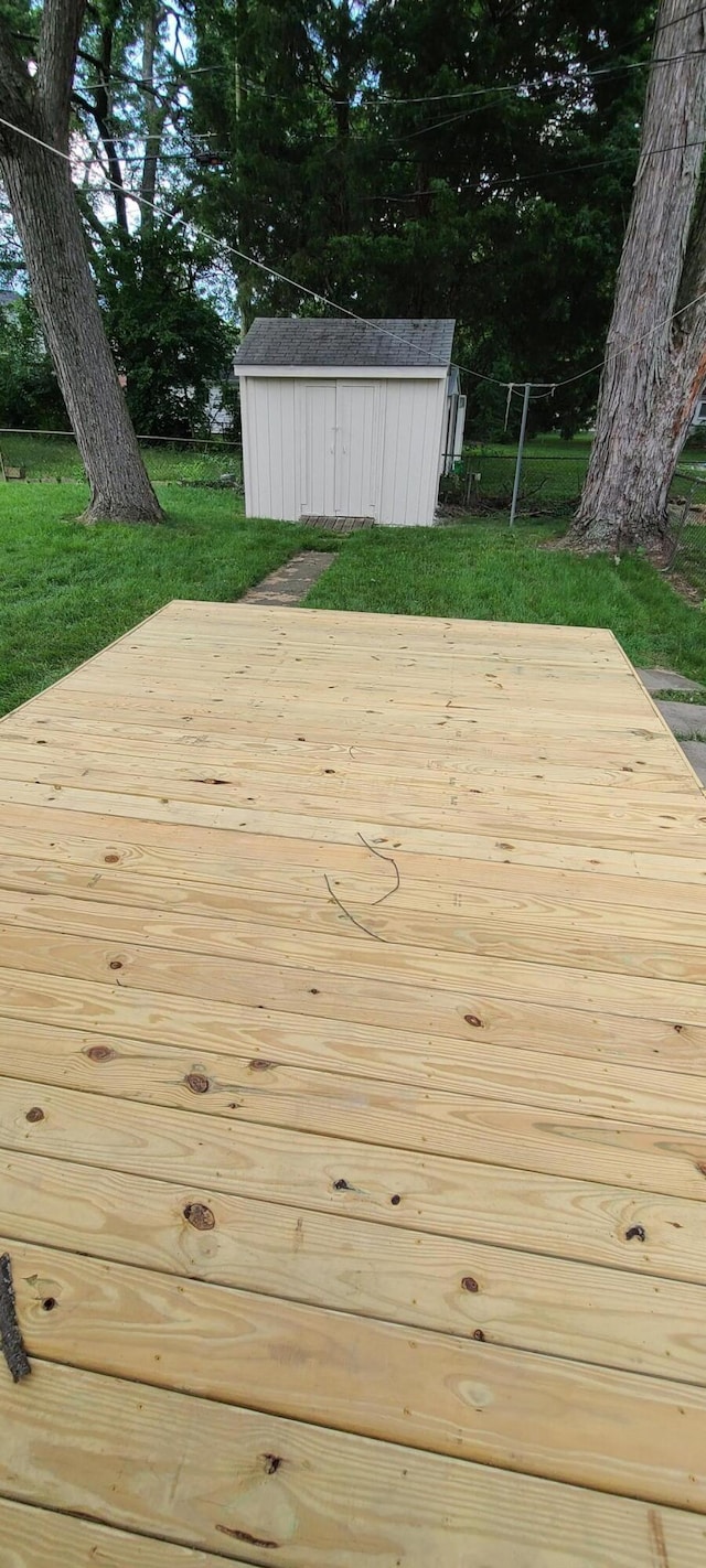 1710 Hess Blvd, Columbus, OH 43212 - wooden terrace featuring a storage shed and view of scattered trees