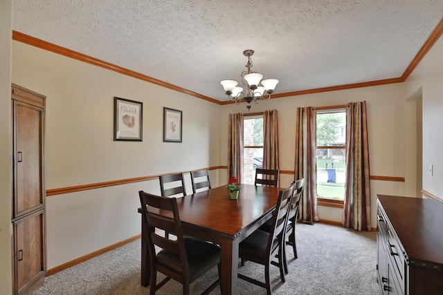 2885 Wynneleaf St, Hilliard, OH 43026 - dining space featuring a chandelier, light carpet, ornamental molding, and a textured ceiling