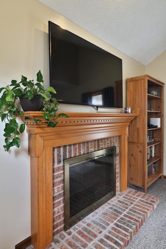 2885 Wynneleaf St, Hilliard, OH 43026 - detailed view of a fireplace and a textured ceiling