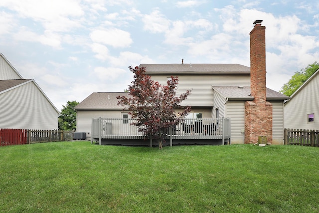 2885 Wynneleaf St, Hilliard, OH 43026 - back of property with a deck, a fenced backyard, and a shingled roof