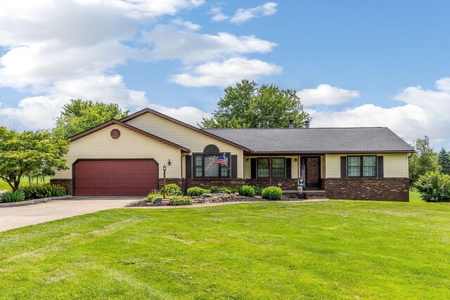 6651 Lancaster Rd, Hebron, OH 43025 - ranch-style house featuring brick siding, an attached garage, driveway, and a front yard