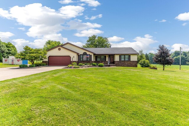 6651 Lancaster Rd, Hebron, OH 43025 - ranch-style home with concrete driveway, a garage, a front lawn, and brick siding