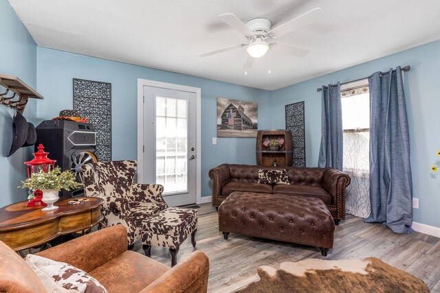 6651 Lancaster Rd, Hebron, OH 43025 - living room featuring wood finished floors, plenty of natural light, and ceiling fan