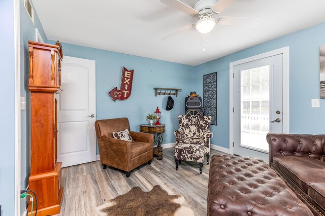 6651 Lancaster Rd, Hebron, OH 43025 - living area featuring ceiling fan and light wood-style floors