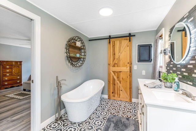6651 Lancaster Rd, Hebron, OH 43025 - full bath with a freestanding tub, double vanity, and backsplash