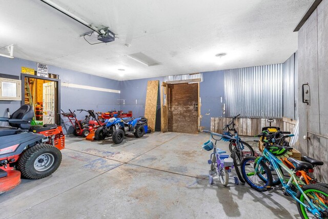 6651 Lancaster Rd, Hebron, OH 43025 - garage featuring a garage door opener