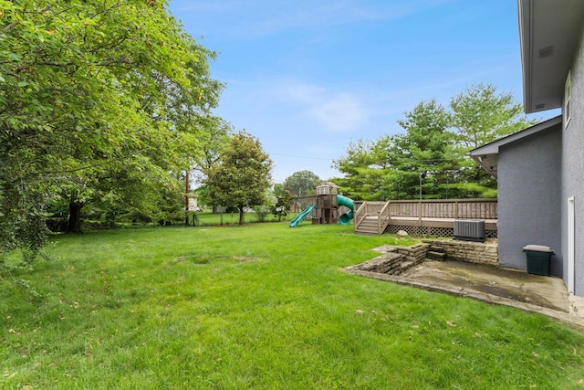 1838 Merriweather Dr, Columbus, OH 43221 - view of green lawn featuring a playground, a deck, and a patio area