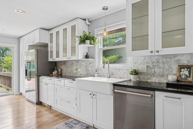 1838 Merriweather Dr, Columbus, OH 43221 - kitchen with appliances with stainless steel finishes, backsplash, white cabinetry, crown molding, and recessed lighting