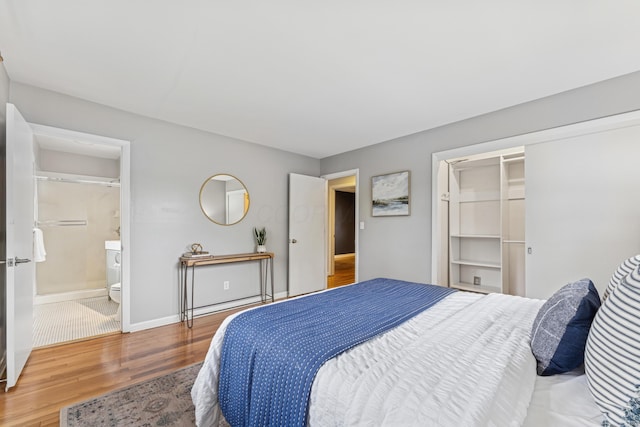 1838 Merriweather Dr, Columbus, OH 43221 - bedroom with wood finished floors and ensuite bathroom
