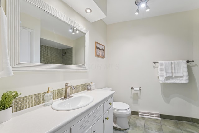 1838 Merriweather Dr, Columbus, OH 43221 - bathroom with vanity, tile patterned floors, backsplash, and a shower