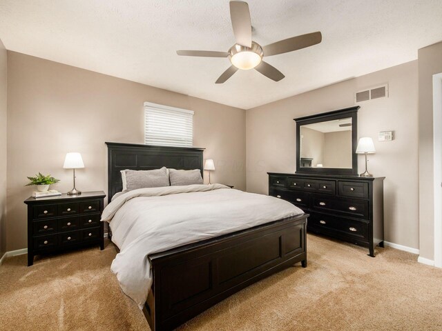 5247 Heathmoor St, Columbus, OH 43235 - bedroom with light carpet and a ceiling fan