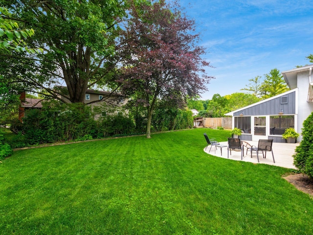 5247 Heathmoor St, Columbus, OH 43235 - view of yard featuring a patio area and a sunroom