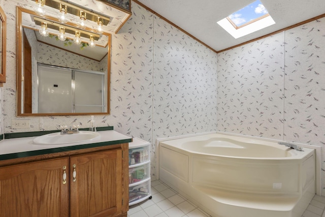 11791 Coontz Rd, Orient, OH 43146 - full bathroom featuring wallpapered walls, a skylight, vaulted ceiling, vanity, and a garden tub