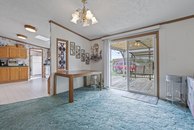 11791 Coontz Rd, Orient, OH 43146 - unfurnished dining area featuring lofted ceiling, a chandelier, ornamental molding, light colored carpet, and a textured ceiling
