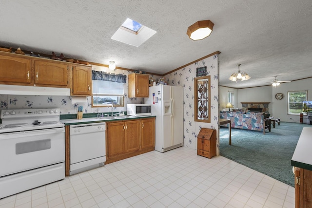 11791 Coontz Rd, Orient, OH 43146 - kitchen featuring white appliances, under cabinet range hood, wallpapered walls, open floor plan, and a textured ceiling