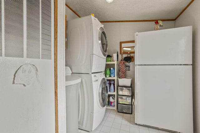 11791 Coontz Rd, Orient, OH 43146 - laundry room with stacked washing machine and dryer, a heating unit, light tile patterned floors, crown molding, and a textured ceiling