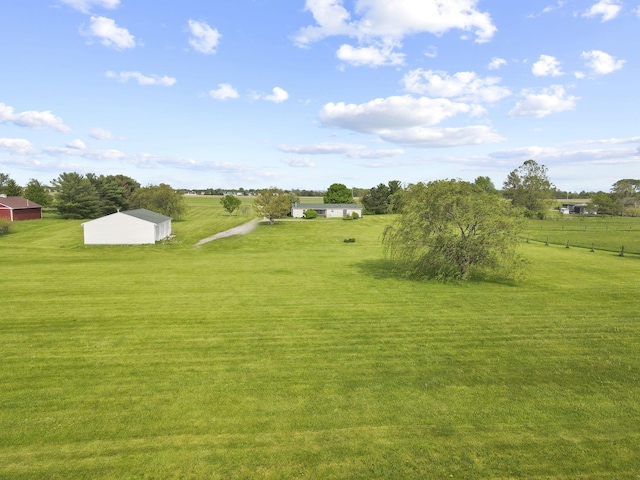 11791 Coontz Rd, Orient, OH 43146 - view of green lawn featuring a view of countryside, a pole building, and an outbuilding