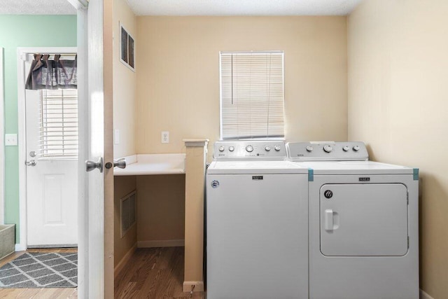 4635 Shalers Dr Unit 44D, Columbus, OH 43228 - laundry room featuring washer and dryer and wood finished floors