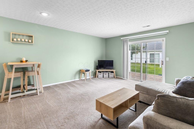 4635 Shalers Dr Unit 44D, Columbus, OH 43228 - living room with a textured ceiling, carpet, and recessed lighting