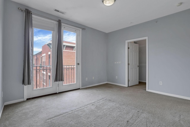 336 S 3rd St Unit 3, Columbus, OH 43215 - spare room with carpet and a smoke detector