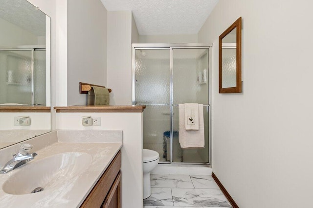 8000 Leaview Dr, Columbus, OH 43235 - bathroom with marble look tiles, a stall shower, vanity, and a textured ceiling