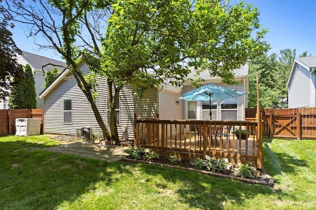 8000 Leaview Dr, Columbus, OH 43235 - rear view of house featuring a fenced backyard and a deck