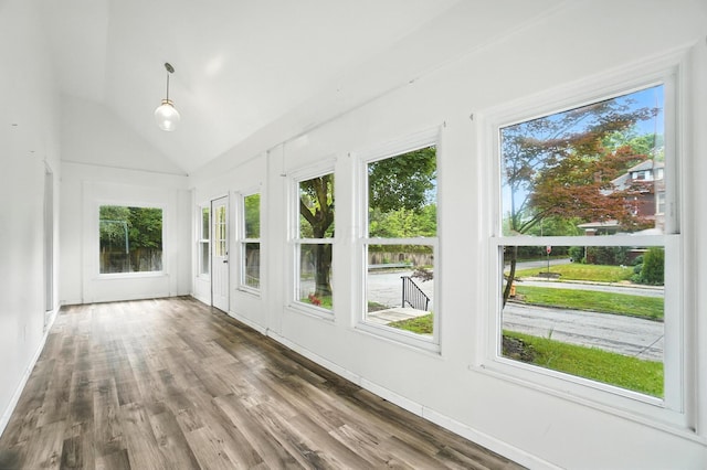 668 Bulen Ave, Columbus, OH 43205 - unfurnished sunroom featuring healthy amount of natural light, vaulted ceiling, and wood finished floors