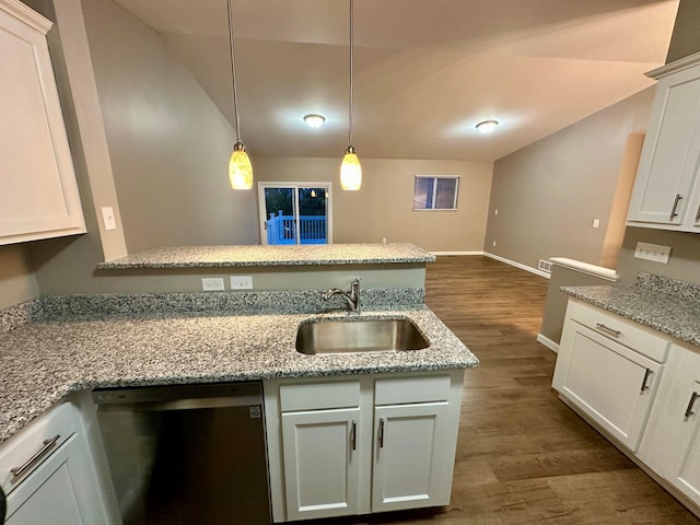 3251 Foxpoint Dr, Hilliard, OH 43026 - kitchen featuring stainless steel dishwasher, dark wood-type flooring, white cabinetry, light stone countertops, and lofted ceiling