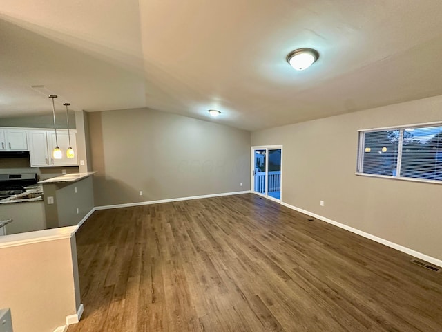 3251 Foxpoint Dr, Hilliard, OH 43026 - unfurnished living room with dark wood-style floors and vaulted ceiling