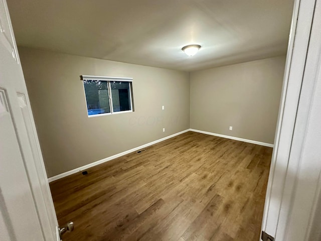 3251 Foxpoint Dr, Hilliard, OH 43026 - empty room with wood finished floors and baseboards