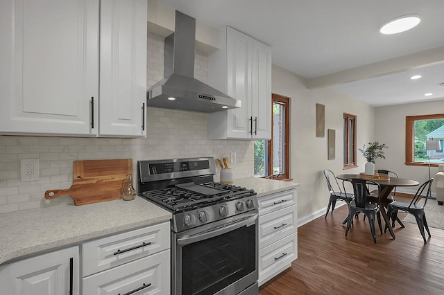 2850 E Moreland Dr, Columbus, OH 43209 - kitchen with stainless steel range with gas cooktop, wall chimney exhaust hood, dark wood finished floors, white cabinets, and recessed lighting