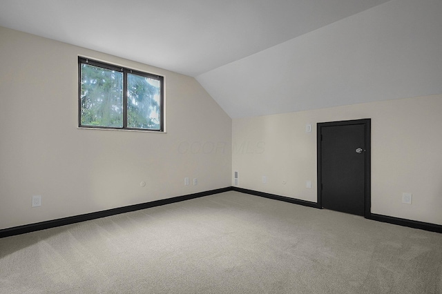 2850 E Moreland Dr, Columbus, OH 43209 - bonus room featuring carpet flooring and vaulted ceiling