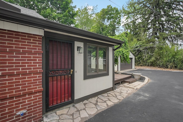 2850 E Moreland Dr, Columbus, OH 43209 - property entrance featuring a detached garage and brick siding