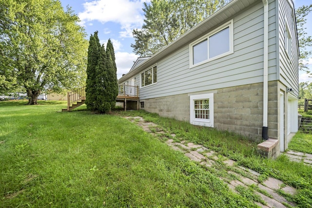 8149 Outville Rd SW, Pataskala, OH 43062 - view of home's exterior featuring a yard and a wooden deck