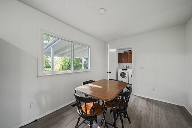 8149 Outville Rd SW, Pataskala, OH 43062 - dining room featuring washing machine and dryer and wood finished floors