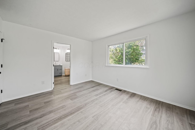 8149 Outville Rd SW, Pataskala, OH 43062 - spare room featuring wood finished floors and baseboards
