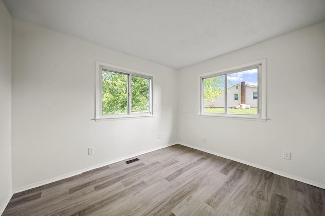 8149 Outville Rd SW, Pataskala, OH 43062 - empty room featuring wood finished floors and baseboards