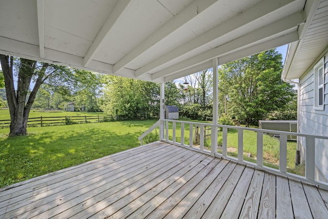 8149 Outville Rd SW, Pataskala, OH 43062 - wooden terrace featuring a storage unit, a fenced backyard, and view of wooded area