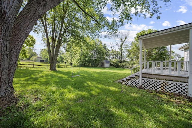 8149 Outville Rd SW, Pataskala, OH 43062 - view of yard with a storage unit and a deck