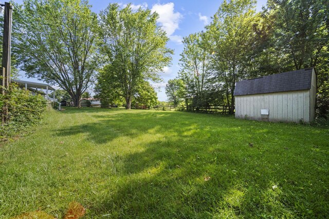 8149 Outville Rd SW, Pataskala, OH 43062 - view of yard featuring a storage unit