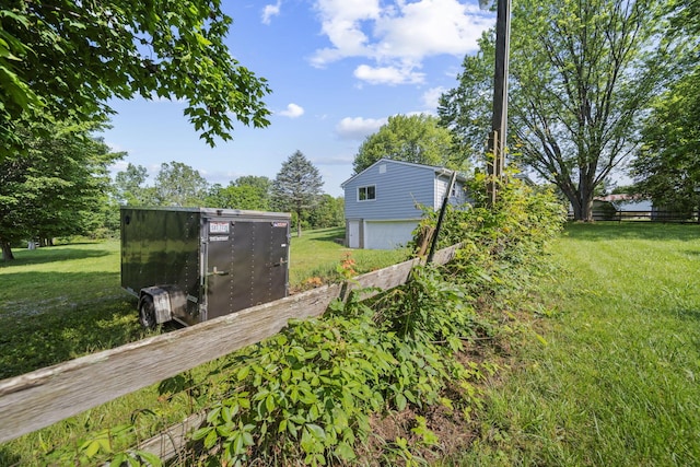 8149 Outville Rd SW, Pataskala, OH 43062 - view of green lawn with a garage
