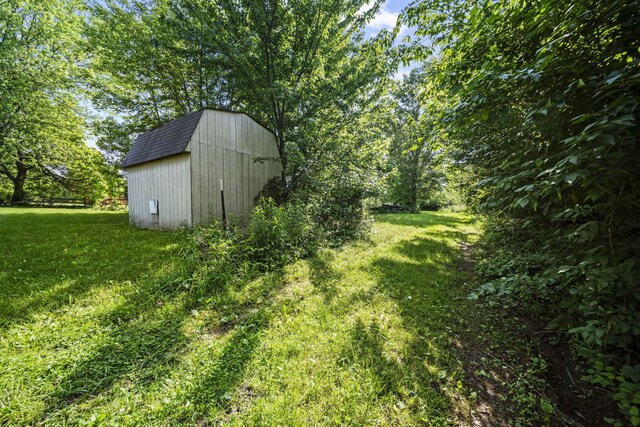 8149 Outville Rd SW, Pataskala, OH 43062 - view of green lawn with a storage unit