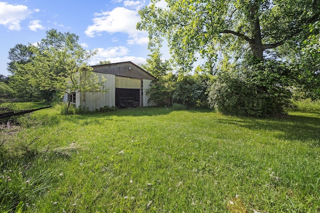 8149 Outville Rd SW, Pataskala, OH 43062 - view of green lawn featuring an outbuilding
